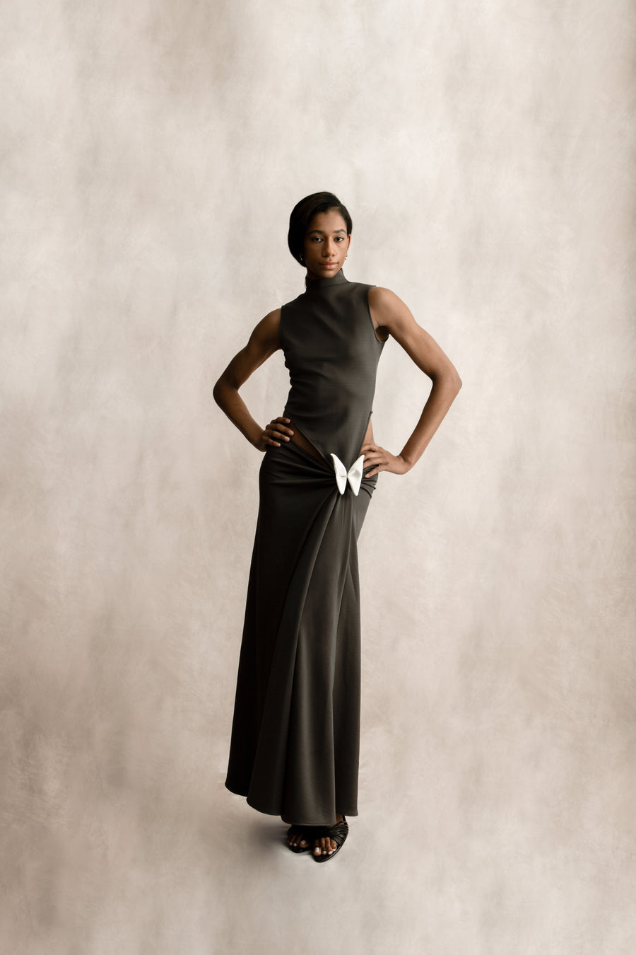 3. High-neck low-rise draped wrap dress in graphite