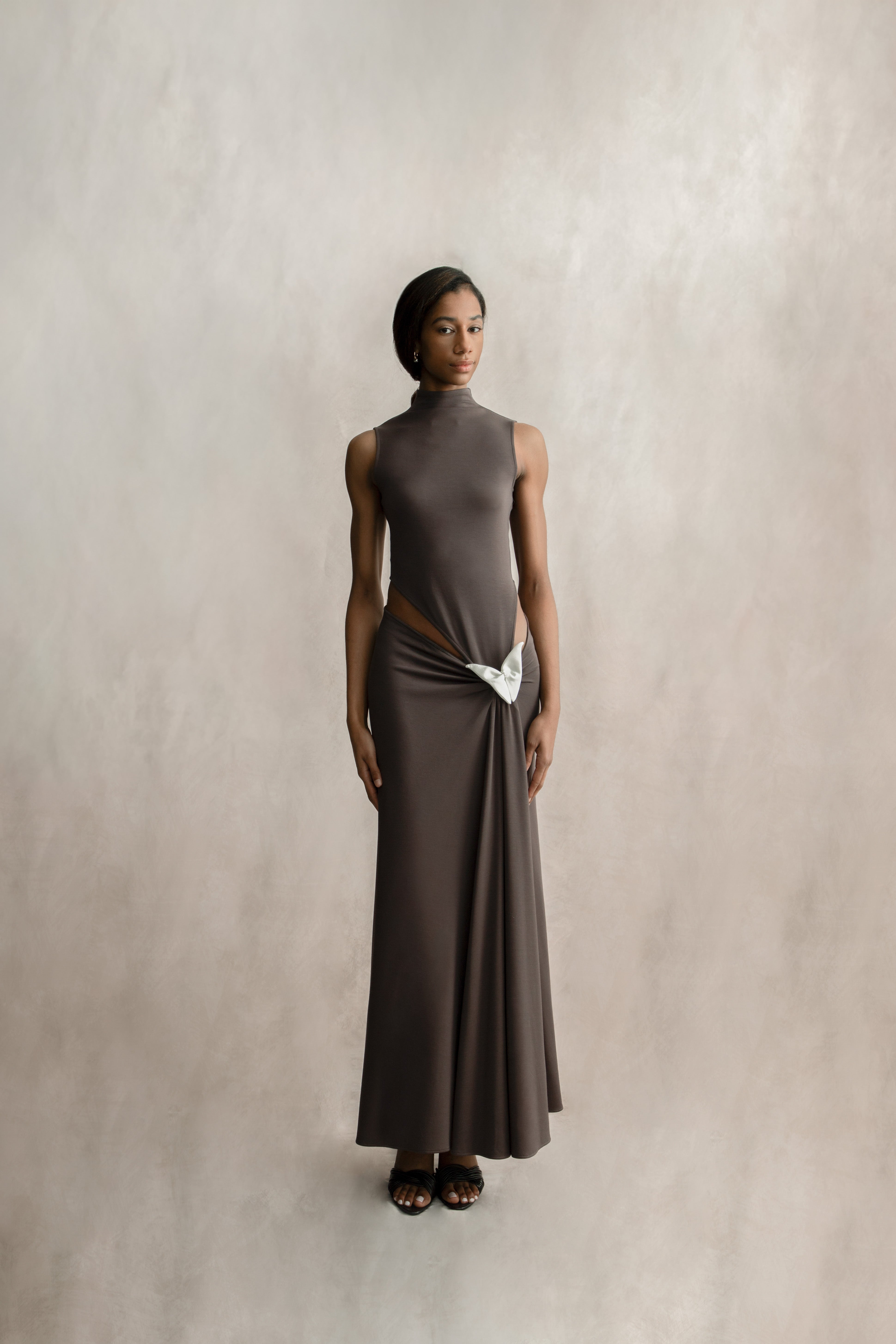 4. HER.I High-Neck Low-Rise Draped Wrap Dress – Taupe