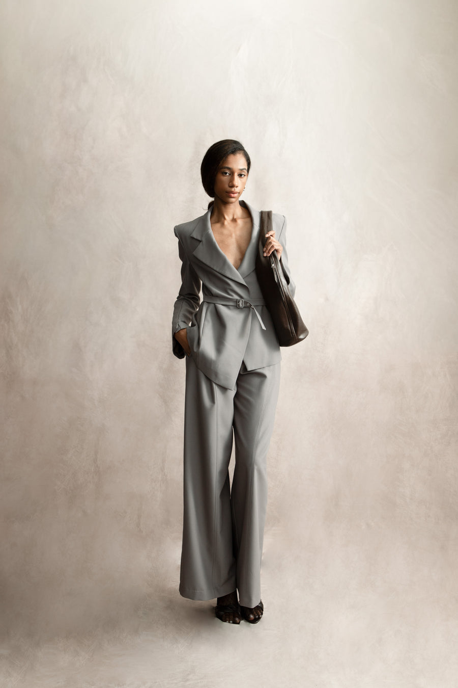 1. The Slate Asymmetric Blazer Dress